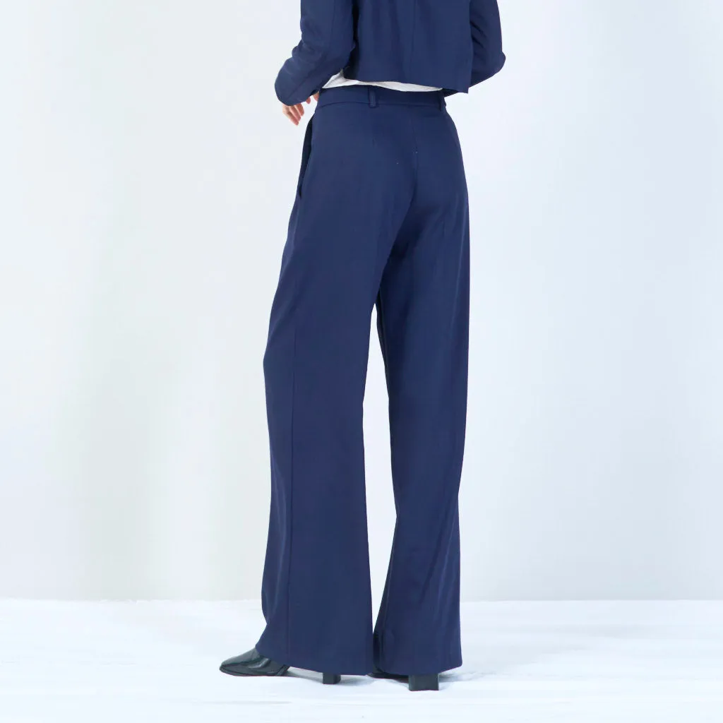 High-waisted trousers with pleated front and button detail wholesale