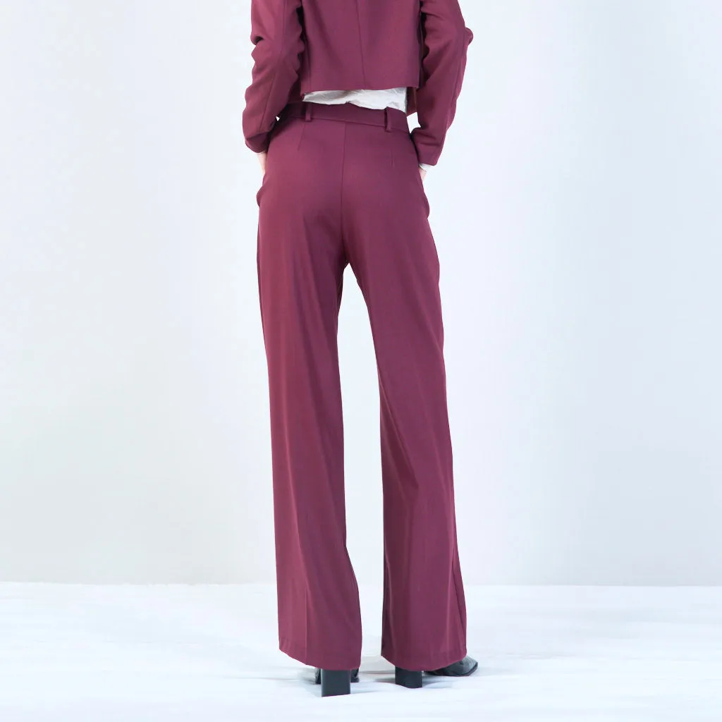High-waisted trousers with pleated front and button detail wholesale