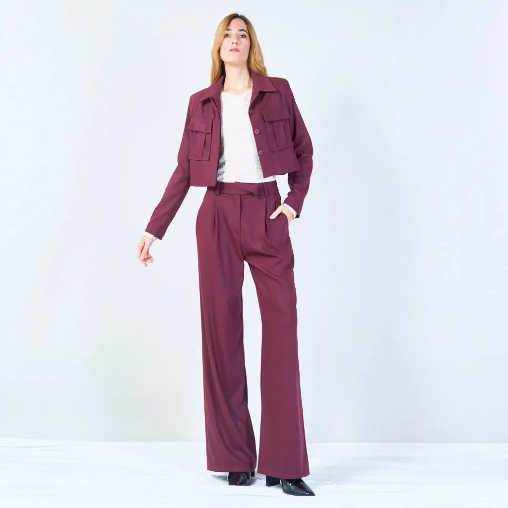 High-waisted trousers with pleated front and button detail wholesale