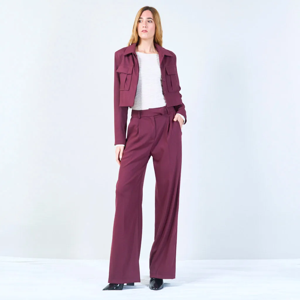 High-waisted trousers with pleated front and button detail wholesale