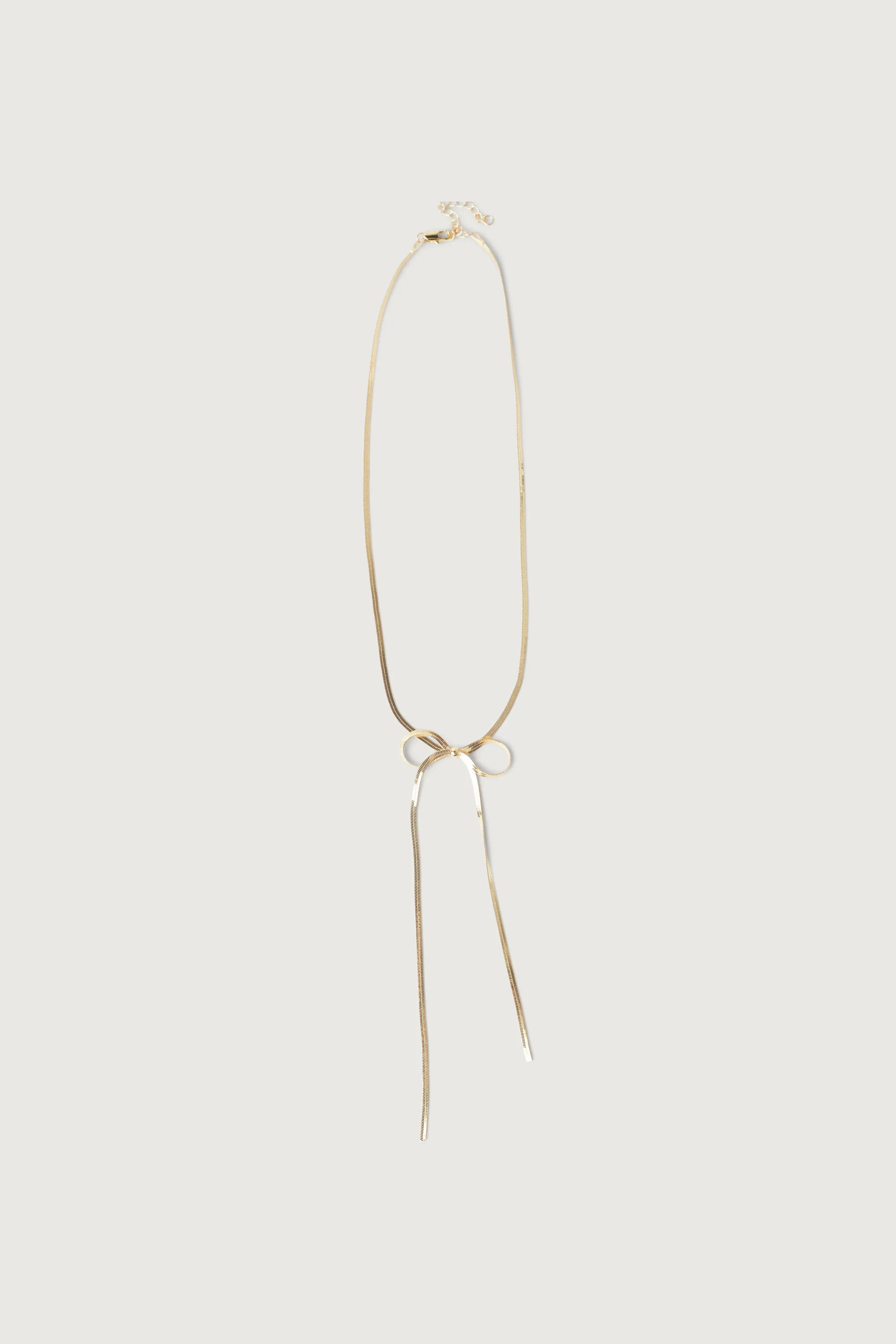 LARGE BOW NECKLACE